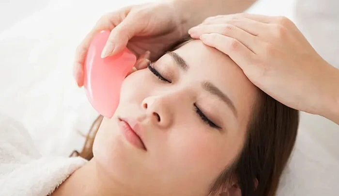 ماساژ صورت با گواشای صورتی 654564120